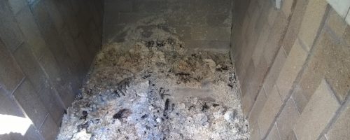 White ash residue left after incineration process