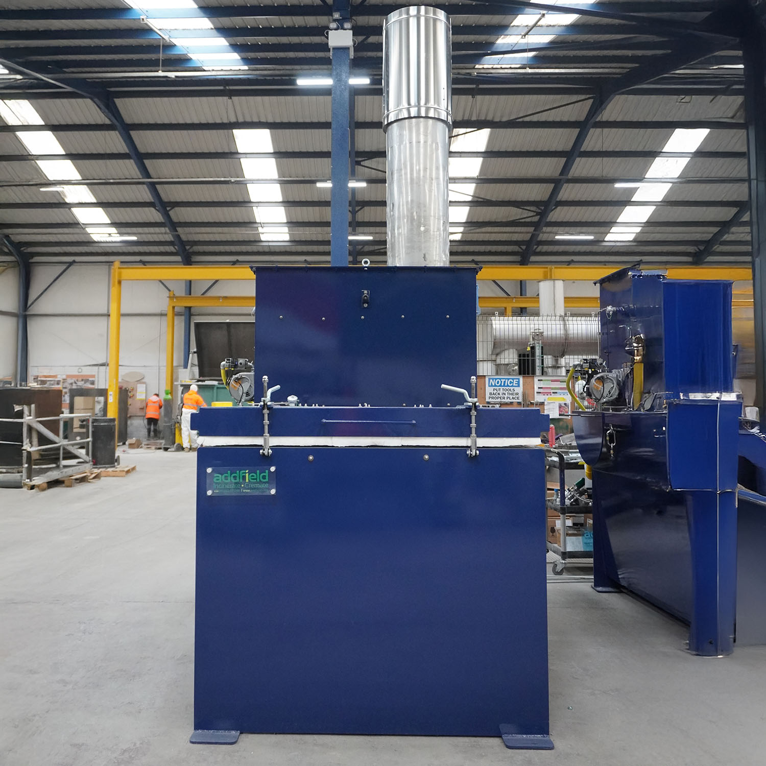 Front of blue aquacultural incinerator