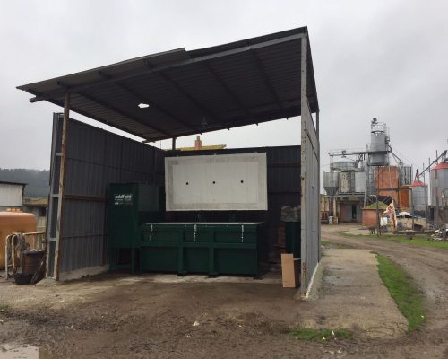 TB Agricultural incinerator housed in a lean to.