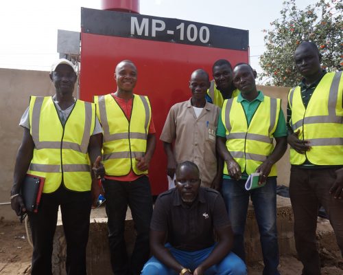 Photo of team following installation of machine.
