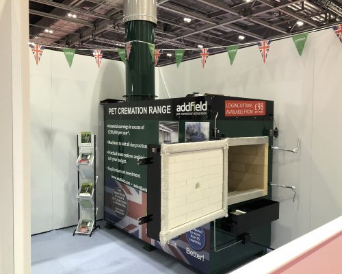 PET-100 cremator with advertisement stickers at london vet show 2018