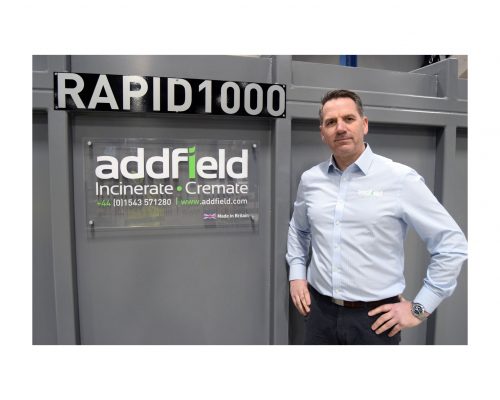 Managing Director in front of high capacity incinerator