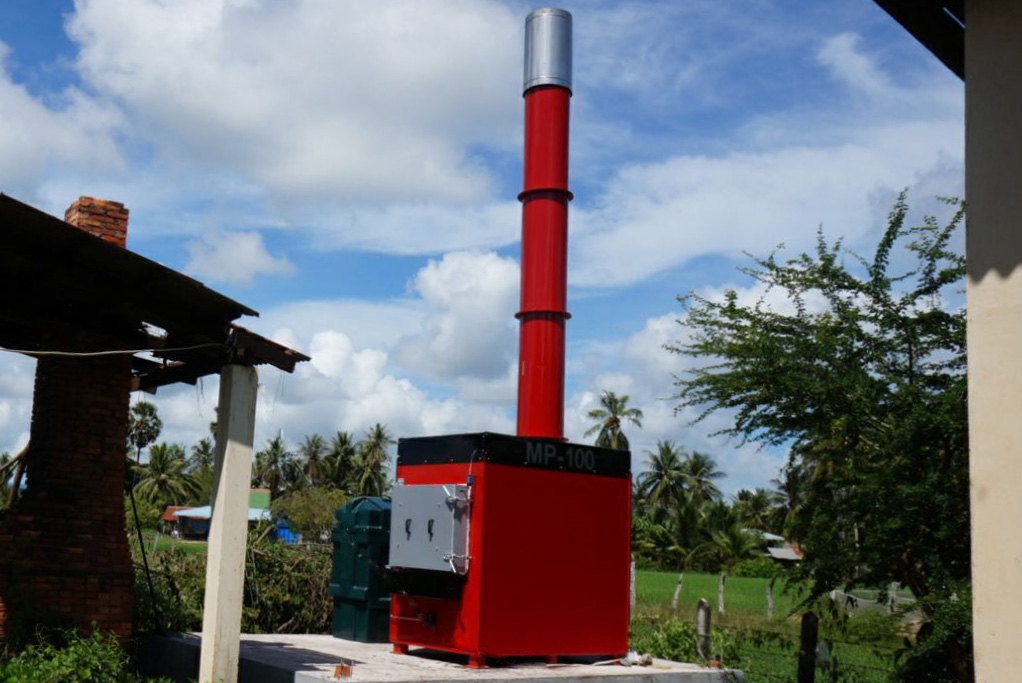 An outdoor installation of an MP100 medical Waste Incinerator