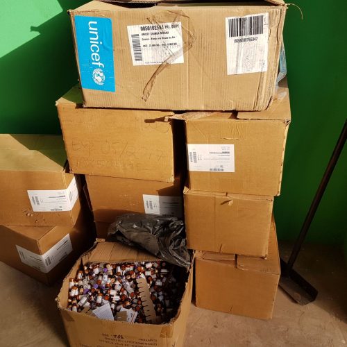 Boxes of used vaccines for disposal by incineration