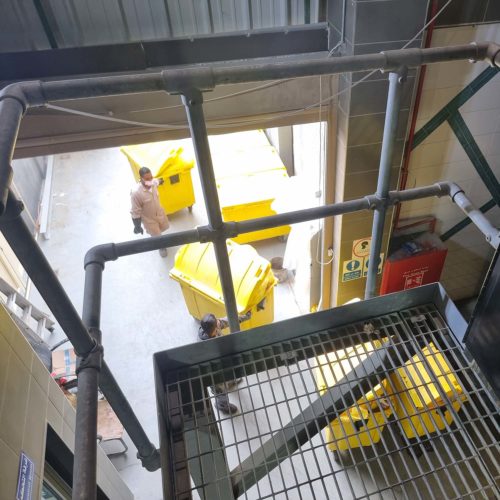 Preparing yellow bins of medical waste for incinerator